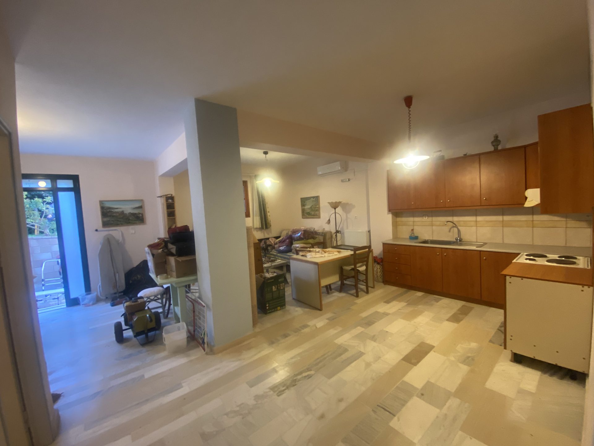 Self-contained garden-level apartment with open-plan living and kitchen