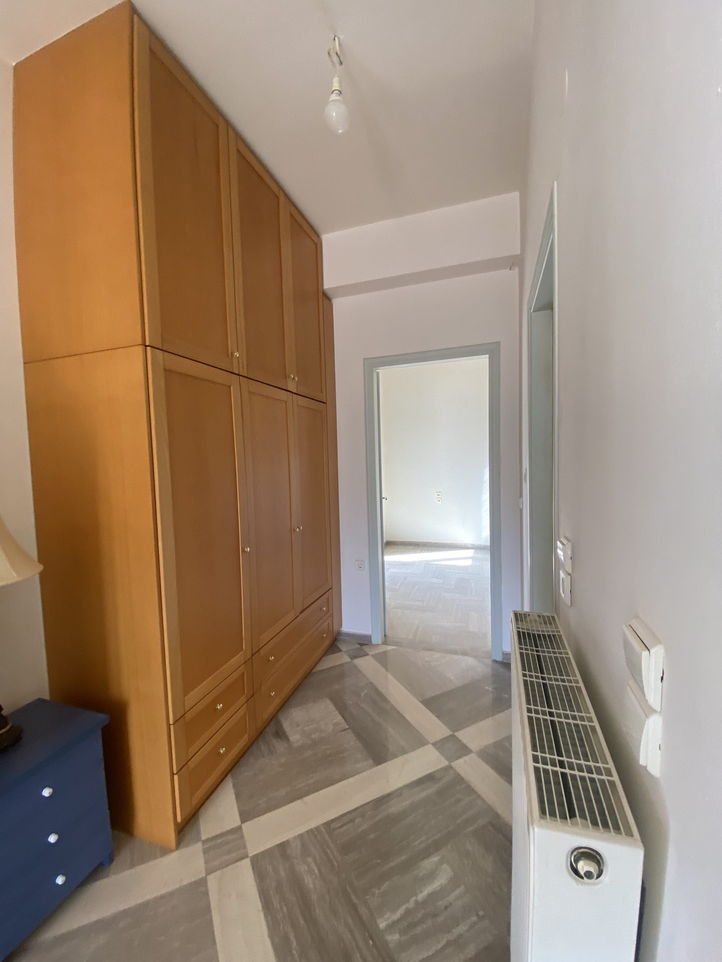 Compact bedroom with wardrobe, suitable for a single bed or office
